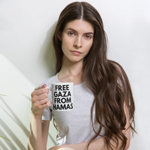 Woman holding a white mug with “Free Gaza from Hamas” text.