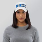 White cap with embroidered Guatemala and Israel flags worn by a woman.